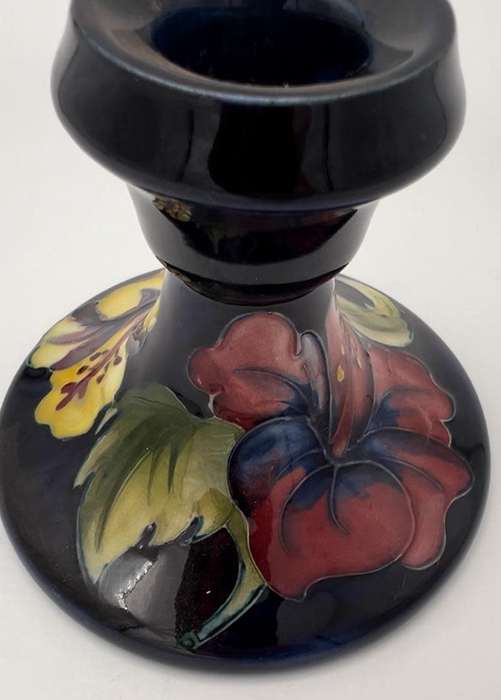 Moorcroft Hibiscus pattern piano candlesticks, blue ground, circa 1960s