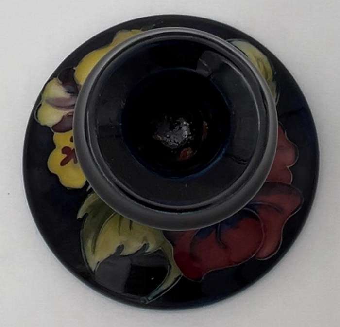 Moorcroft Hibiscus pattern piano candlesticks, blue ground, circa 1960s