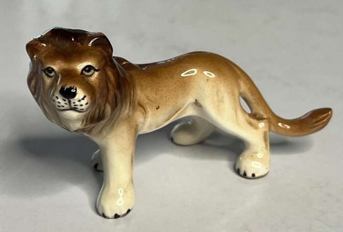 Lion and dog figurine
