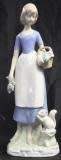 A young lady with a squirrel statue - By Heritage Porcelain