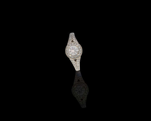 4.7gr 18kt White Gold 0.50ct Round Rrilliant I SI1 Halo with smalls  c/w Diamond Cetificate