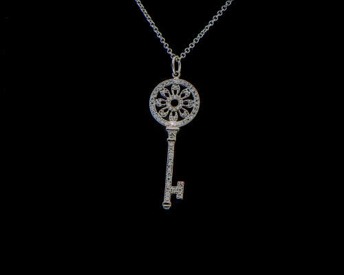 3.2 grams 9 carat White Gold, Chain and Diamond Key Pendant
