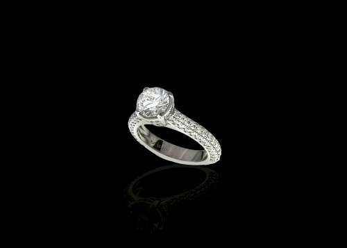 10.98 grams Platinum ORO Design Fancy Solitaire and Diamond Encrusted Ring