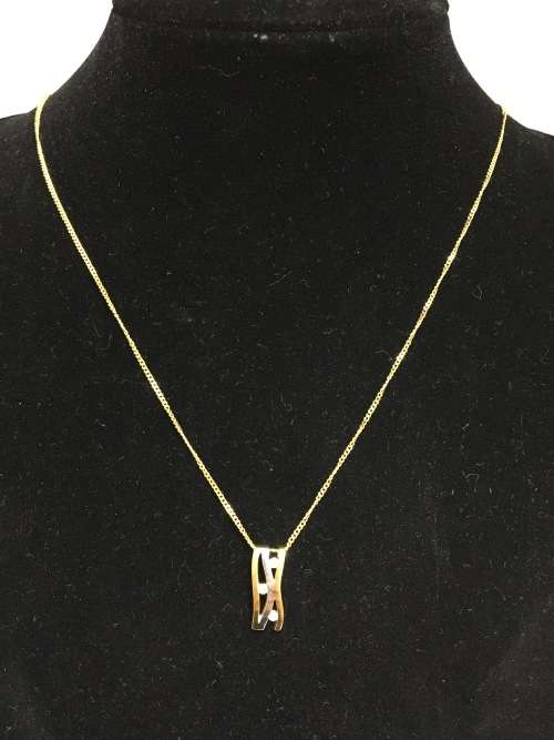 3.1 grams 9 carat Yellow Gold Chain with a Two Tone and Diamond Pendant