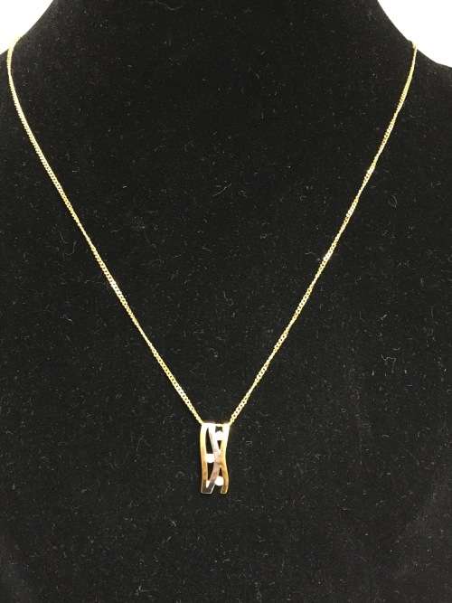 3.1 grams 9 carat Yellow Gold Chain with a Two Tone and Diamond Pendant