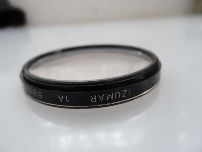 IZUMAR  1A 52 mm SCREW IN FILTER , NO CRACKS, OR SCRATCHES R25.00