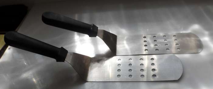 TWO PLANCHER GRILL / FLAT TOP GRILL STAINLESS STEEL SPATULAS      -  as new