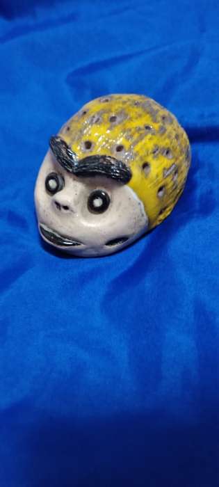 Ugly Paper weight or Ornament ! Must have Item! Very Distracting !