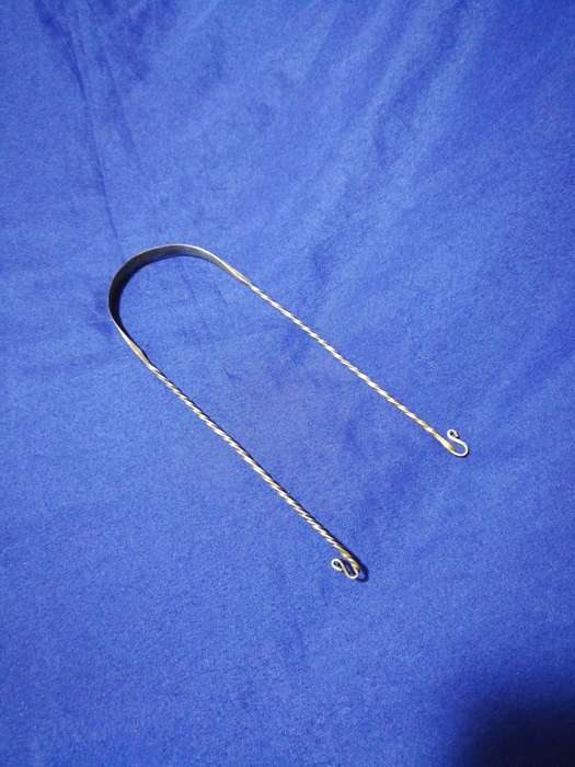 Rare Antique silver tongue cleaner.