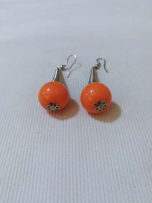 Eye catching, arty hanging orange bead earrings