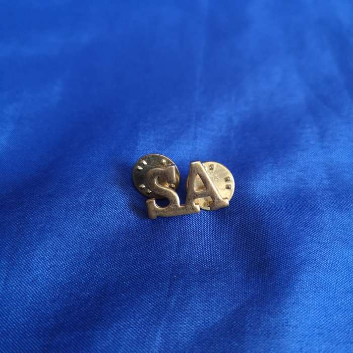 SADF collar badge `SA`