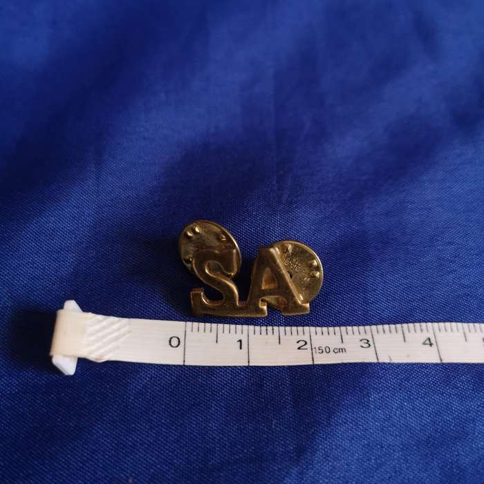 SADF collar badge `SA`