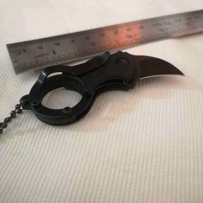 Eagle Claw Knife with around the neck chain. Unused