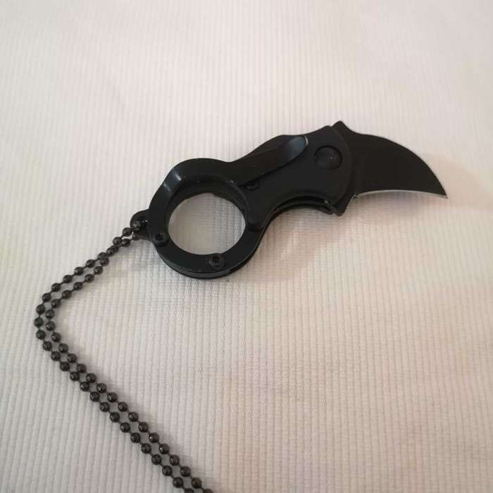 Eagle Claw Knife with around the neck chain. Unused