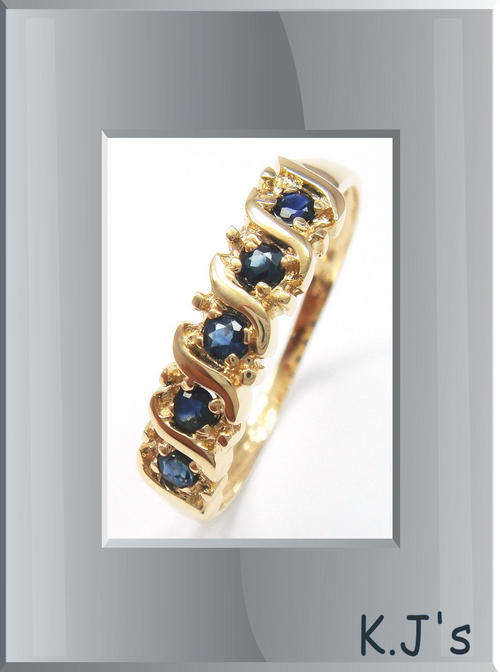 9ct solid gold & genuine saphire ring
