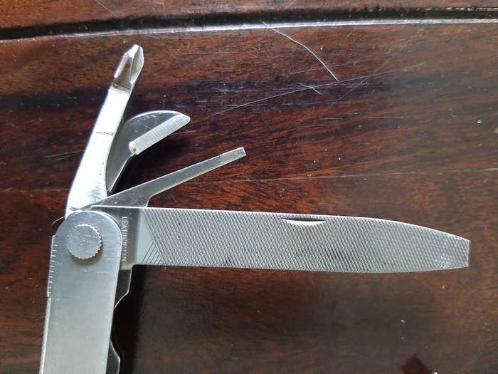Leatherman LM832518 Heritage PST Multi-tool number 0298 with leather and synthetic pouch, like new