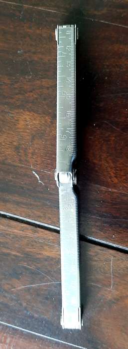 Leatherman LM832518 Heritage PST Multi-tool number 0298 with leather and synthetic pouch, like new