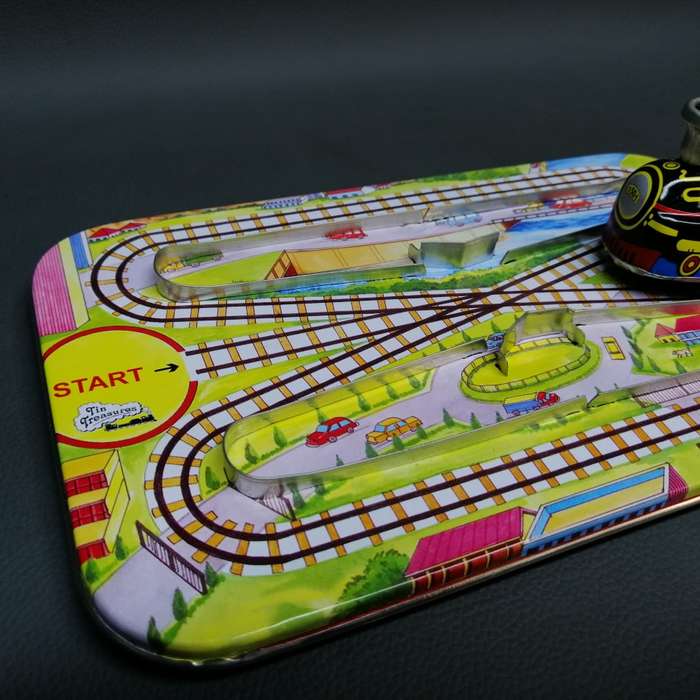 Highly Collectible Lithographed Wind Up Tin Toy Train and Track!!!