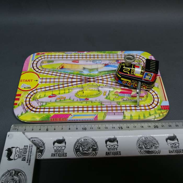 Highly Collectible Lithographed Wind Up Tin Toy Train and Track!!!