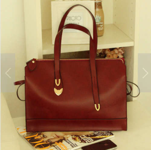 Wild use ladies big size handbag. Wine red color. Stock in ZA