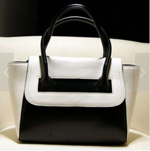 Genuine leather fluorescence color joint ladies handbag with strape. Black and white classic.