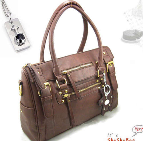 Office ladies wild use handbag with strap, brown color. Stock in ZA