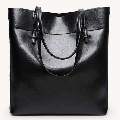 Smooth surface fashion large capacity ladies handbag with strape, Blackb color. Stock in ZA