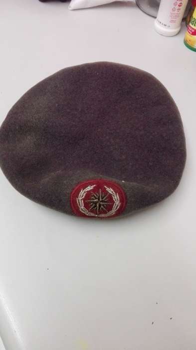 Reece/sp beret original. Maroon faded of the top from sun. Size54