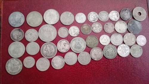 A lot of silver coins all different some good Somme bad there might be 3 or 4 that's not silver. 40