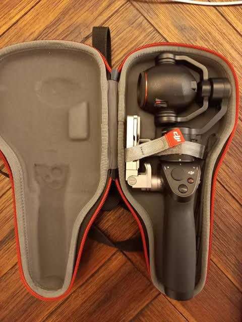 DJI OSMOS HAND HELD GIMBAL 4K CAMERA 4-14MM f/2.8 MODEL FC350Z MINT CONDITION AS NEW