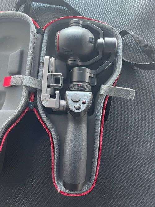 DJI OSMOS HAND HELD GIMBAL 4K CAMERA 4-14MM f/2.8 MODEL FC350Z MINT CONDITION AS NEW