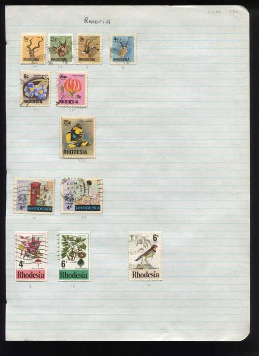 Rhodesia - 12 Stamps Mounted on Old Album Page