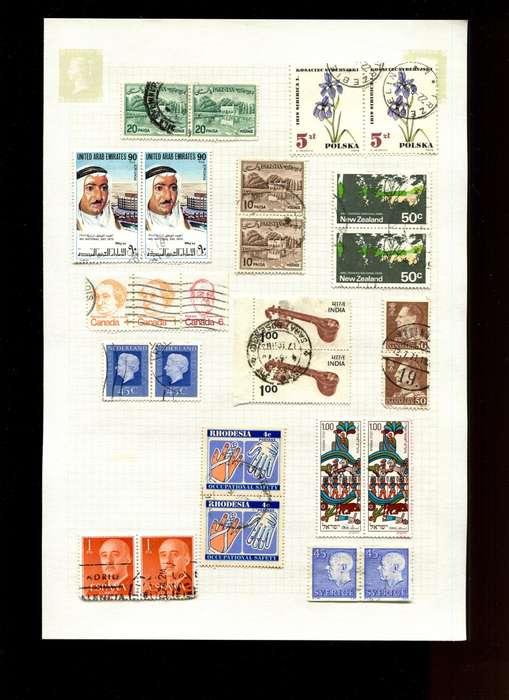 Word Mix in Multiples - 27 Stamps  Mounted On Old Album Page