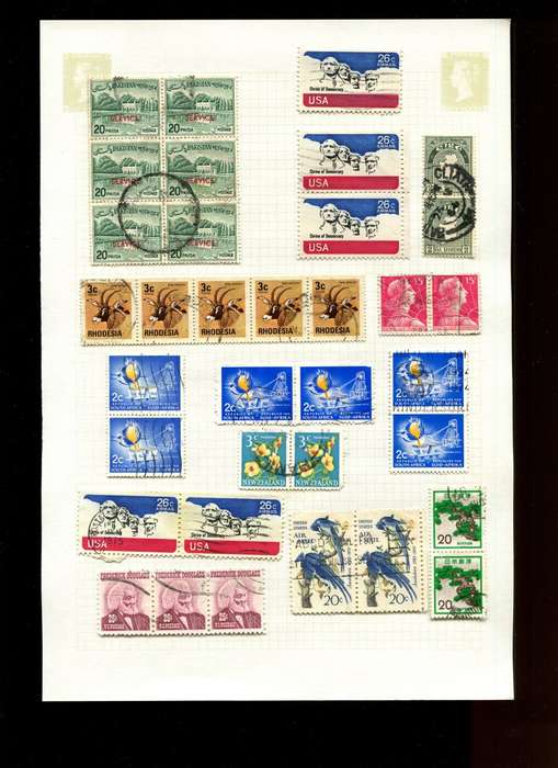Word Mix in Multiples - 35 Stamps  Mounted On Old Album Page