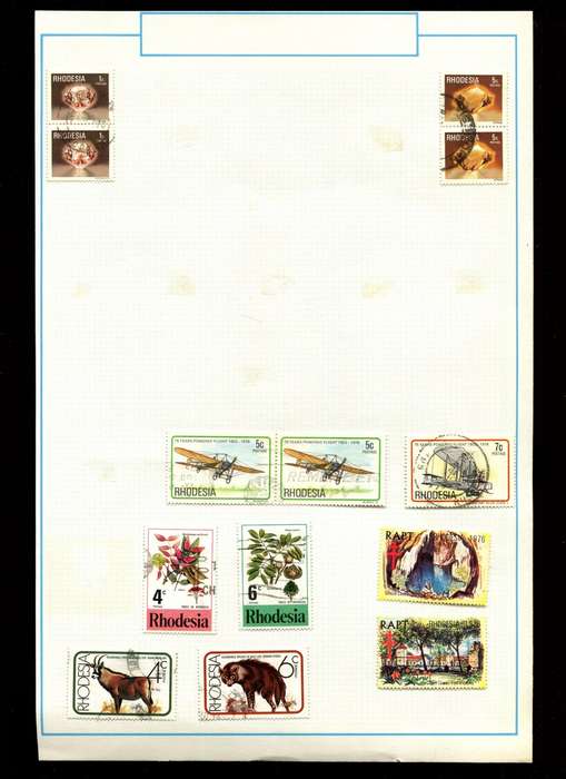 Rhodesia - 13 Stamps on Old Album Page
