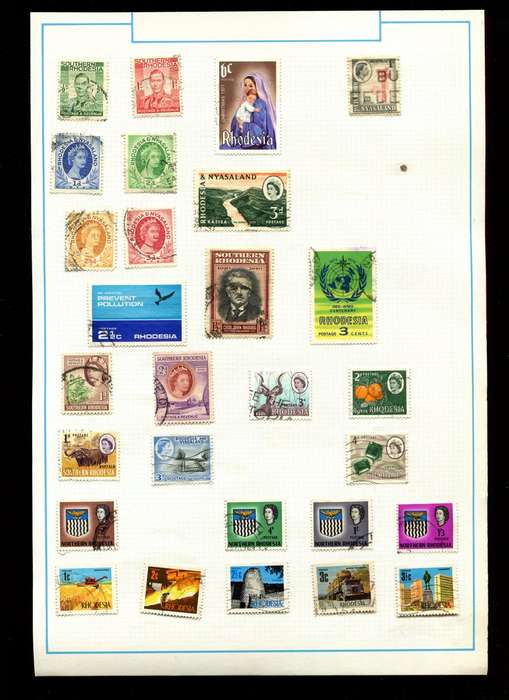 Rhodesia - 28 Stamps on Old Album Page