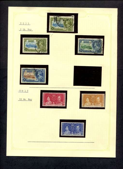 Northern Rhodesia -7 Stamps Mounted (Hinged) On Old Album Page