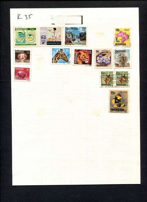 Rhodesia - 13 Stamps Mounted (Hinged) On Album Page