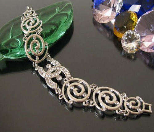 R120 only !! Silver Designer Sparkling Bracelet with 50stone Genuine Crystal !!