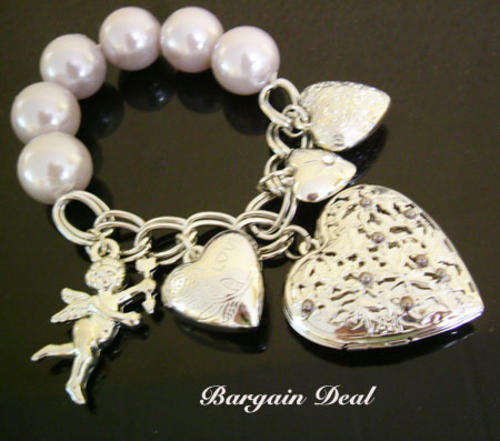 R100 only! Designer Silver Bracelet with Antique Style Heart Shaped Locket and Jupiter Charms !!