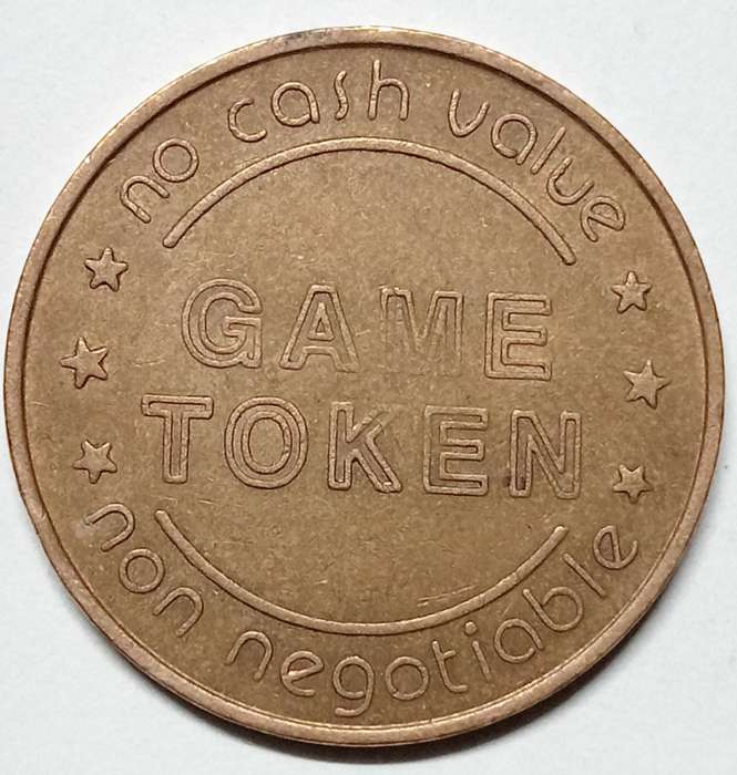 THE MAGIC COMPANY GAMING TOKEN- BRASS