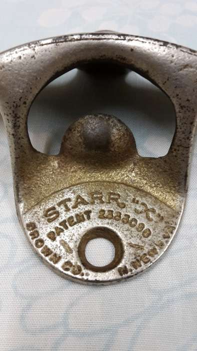 1950s Wall Mount Coke Bottle opener .