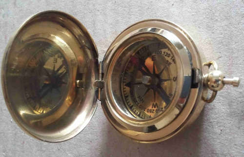 Compass. Push button watch compass solid brass.                                nb3