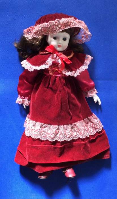 Two Collectable Vintage Porcelain Display Dolls with stands