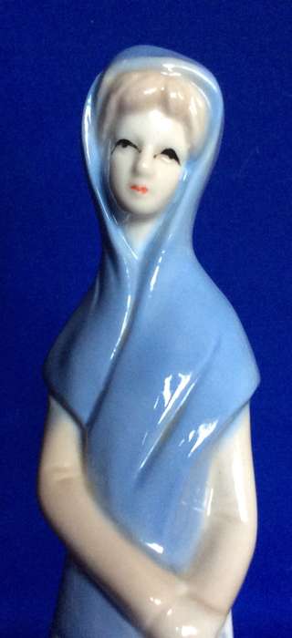 Set of Three Porcelain Figurines in Pastel Tones
