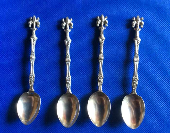 Vintage Ornate Handle spoons x 4