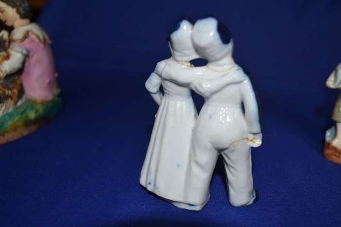 Boy with Dog Porcelain Group plus  Three Small Porcelain Figurines
