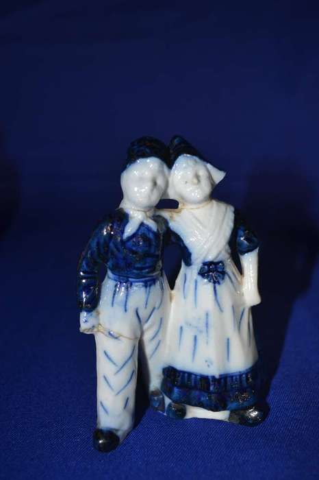 Boy with Dog Porcelain Group plus  Three Small Porcelain Figurines