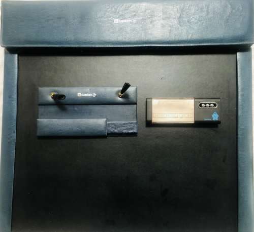 MATCHING LEATHER BLUE DESKTOP SET WITH SANLAM BRANDING: STATIONERY CONTAINERS & LETTER OPENER