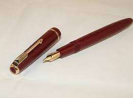 PARKER BURGUNDY SLIMFOLD FOUNTAIN PEN WITH 14K GOLD NIB AND MATCHING PENCIL
